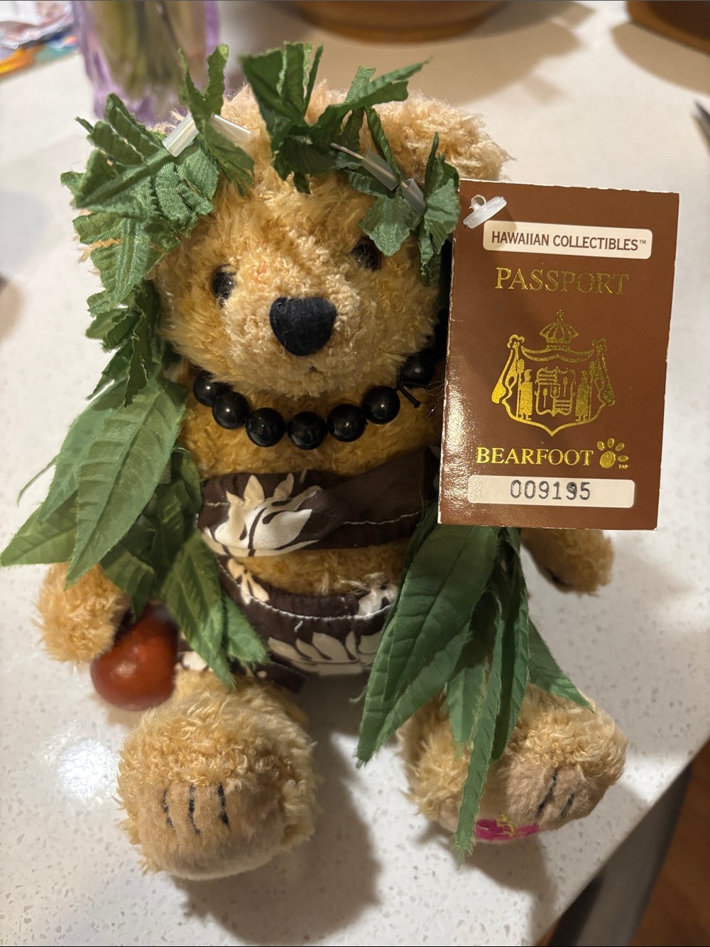 Hawaiian Collectibles Bearfoot Brown Plush Bear with Green Leaf Lei